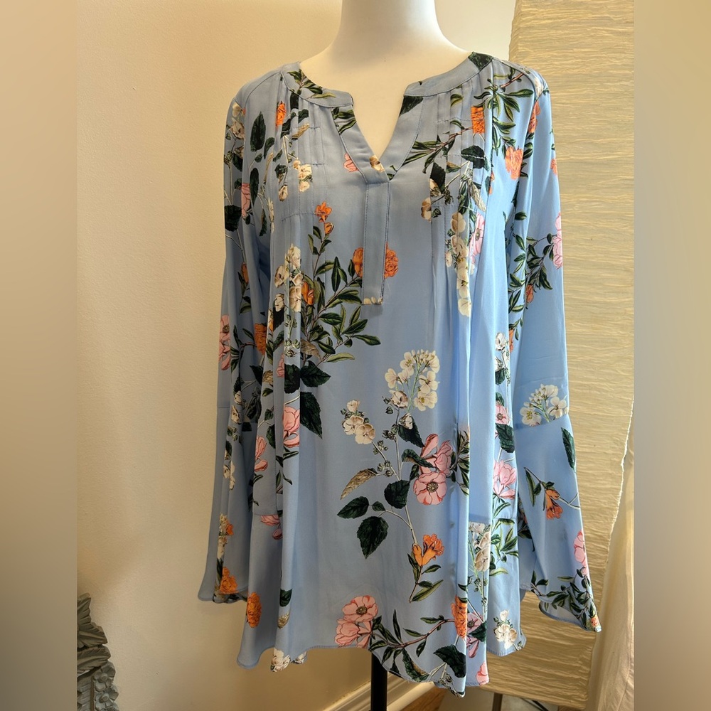 Whimsical Blue Flowing Blouse with Long Trumpet Sleeves